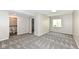 Finished basement bedroom with neutral colored walls, carpet and an adjacent bathroom at 6160 Hardwick Dr, Whitestown, IN 46075