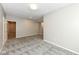 Finished basement provides ample space for recreation and relaxation, with neutral walls and carpet at 6160 Hardwick Dr, Whitestown, IN 46075