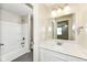 Bathroom featuring a single sink vanity and a shower and tub combination at 6160 Hardwick Dr, Whitestown, IN 46075