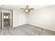 Bedroom with closet, double doors, neutral carpet, and modern paint at 6160 Hardwick Dr, Whitestown, IN 46075