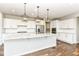 Beautiful kitchen with stainless steel appliances, granite countertops, and a large center island at 6160 Hardwick Dr, Whitestown, IN 46075