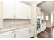 Well-equipped kitchen featuring granite countertops, modern appliances, and ample cabinet space at 6160 Hardwick Dr, Whitestown, IN 46075