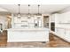 Bright kitchen with stainless steel appliances, granite countertops, and a large center island at 6160 Hardwick Dr, Whitestown, IN 46075