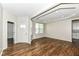 Bright living room with hardwood floors, recessed lighting, large windows, and modern paint at 6160 Hardwick Dr, Whitestown, IN 46075