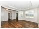 Living room with tray ceiling, hardwood floors, recessed lighting and plenty of natural light at 6160 Hardwick Dr, Whitestown, IN 46075