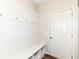 Mudroom with seating, storage, and hooks at 6160 Hardwick Dr, Whitestown, IN 46075
