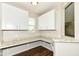 Convenient pantry with granite countertops, cabinets, and storage space at 6160 Hardwick Dr, Whitestown, IN 46075