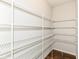 Walk-in pantry with plenty of shelving at 6160 Hardwick Dr, Whitestown, IN 46075