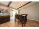 Well-lit dining room with wood floors, a dining table with seating for six, and an aquarium at 640 Shady Creek Ct, Greenwood, IN 46142