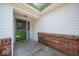 Charming home entry with brick wall and decorative door at 640 Shady Creek Ct, Greenwood, IN 46142