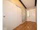 Bright hallway with neutral walls, and black ceiling beams at 640 Shady Creek Ct, Greenwood, IN 46142