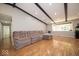Spacious living room with hardwood floors, cozy couch and natural light at 640 Shady Creek Ct, Greenwood, IN 46142