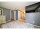 Cozy main bedroom featuring plush carpet, stylish decor and access to the ensuite bath at 640 Shady Creek Ct, Greenwood, IN 46142