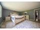 Spacious main bedroom featuring carpeted floors, natural light and ample closet space at 640 Shady Creek Ct, Greenwood, IN 46142