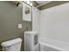 Neat bathroom featuring a bathtub and vanity with storage, providing a clean and functional space at 6514 Jackson St, Indianapolis, IN 46241