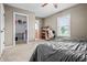 Bedroom showcasing a bed, closet, bookcase, and carpet flooring at 6702 W Willow Grove Dr, New Palestine, IN 46163