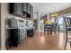 Functional nook with counter space and dark cabinets, conveniently located next to the kitchen at 6702 W Willow Grove Dr, New Palestine, IN 46163