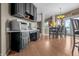 Cozy area featuring a dedicated desk area, built in cabinets and hardwood floors at 6702 W Willow Grove Dr, New Palestine, IN 46163