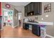 A home office featuring built in cabinets and drawers with ample storage space at 6702 W Willow Grove Dr, New Palestine, IN 46163