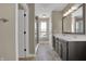 Bathroom featuring double vanity, walk-in shower, tile flooring, and ample natural light at 6770 W Buck Stone Dr, McCordsville, IN 46055