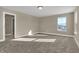 Bedroom featuring carpet, natural light, and closet space for a restful retreat at 6770 W Buck Stone Dr, McCordsville, IN 46055