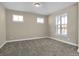 Cozy bedroom with neutral color scheme, plush carpet, and natural light at 6770 W Buck Stone Dr, McCordsville, IN 46055