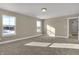 Bright bedroom featuring carpet, natural light, and closet space for a restful retreat at 6770 W Buck Stone Dr, McCordsville, IN 46055