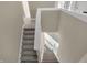 Carpeted staircase connecting different levels of the home ensures safe and easy movement at 6770 W Buck Stone Dr, McCordsville, IN 46055