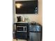 Living area with mini-fridge, microwave, coffee maker, and tv at 711 E 16Th St, Indianapolis, IN 46202