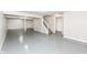Spacious unfinished basement with concrete floors, support beams, and stairs leading to the upper level at 7168 Camwell Dr, Indianapolis, IN 46268