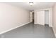 Basement space featuring concrete floors and an open doorway leading to another room at 7168 Camwell Dr, Indianapolis, IN 46268