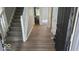 Welcoming entryway with hardwood floors, a staircase, and access to the rest of the house at 7168 Camwell Dr, Indianapolis, IN 46268