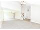 Bright living room featuring high ceilings, carpet flooring, and elegant chandelier at 7168 Camwell Dr, Indianapolis, IN 46268