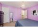 Stylish purple bedroom with modern decor and plenty of space at 7193 Wythe Dr, Noblesville, IN 46062