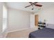 Bright bedroom with beige walls, plush carpet, and a window with natural light at 7193 Wythe Dr, Noblesville, IN 46062