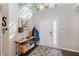 Bright foyer featuring a patterned rug, console table, and a well-lit entrance at 7193 Wythe Dr, Noblesville, IN 46062