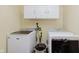 Laundry area features a side-by-side washer and dryer setup and above cabinet for storage at 7193 Wythe Dr, Noblesville, IN 46062