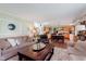 Spacious living room offers a cozy atmosphere with hardwood floors and open access to the kitchen at 7193 Wythe Dr, Noblesville, IN 46062