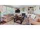 Comfortable living room with built-in shelving, fireplace, and plush seating at 7193 Wythe Dr, Noblesville, IN 46062