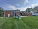 Spacious backyard with deck, swing, and ample green space at 7346 E Buddy Ln, Camby, IN 46113