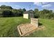 Backyard with well-kept horseshoe pit and shed providing outdoor activity at 7346 E Buddy Ln, Camby, IN 46113