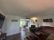 View of the living room leading to the dining area and backyard at 7346 E Buddy Ln, Camby, IN 46113