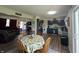Open-concept living and dining area with view of kitchen at 7346 E Buddy Ln, Camby, IN 46113