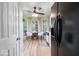 Bright breakfast nook with white chairs and ample natural light from bay windows at 7743 Waterwood Dr, Indianapolis, IN 46214