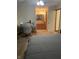 This is a bedroom featuring a work desk with neutral-colored walls and an ensuite bathroom at 7950 Eagle Valley Pass, Indianapolis, IN 46214