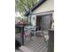 Cozy patio with table, chairs, and umbrella, providing a peaceful outdoor space next to the home at 7950 Eagle Valley Pass, Indianapolis, IN 46214