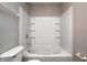 This is a bathtub with a shower, accompanied by a toilet at 8030 Cork Bend Ln, Indianapolis, IN 46239