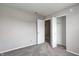 Bedroom featuring neutral carpet, closet, white trim, and open white door at 8030 Cork Bend Ln, Indianapolis, IN 46239