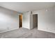 This is a bedroom featuring neutral walls, plush carpeting, and access to other rooms of the house at 8030 Cork Bend Ln, Indianapolis, IN 46239