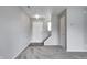 Open living area features new carpeting, fresh paint, and a staircase leading to the upper level at 8030 Cork Bend Ln, Indianapolis, IN 46239